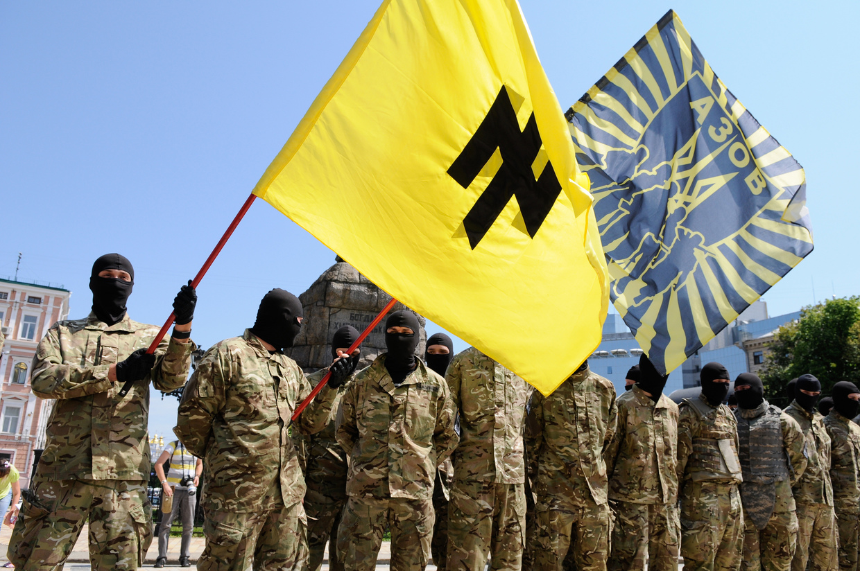 Azov battalion soldiers take an oath of allegiance to Ukraine in Kiev's Sophia Square before being sent to the Donbass region