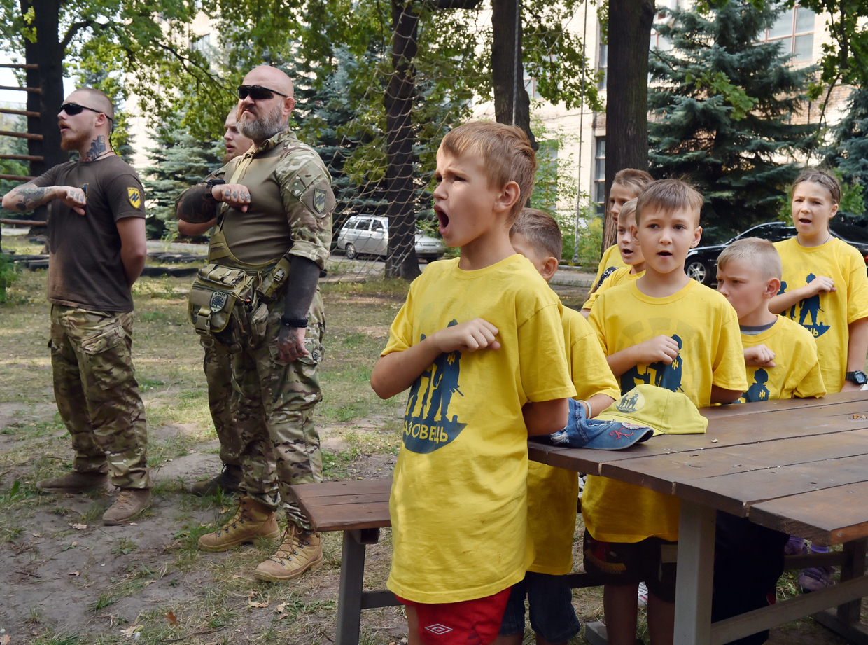 Vacationing children undergo military training at a base of the Azov battalion in Kiev 